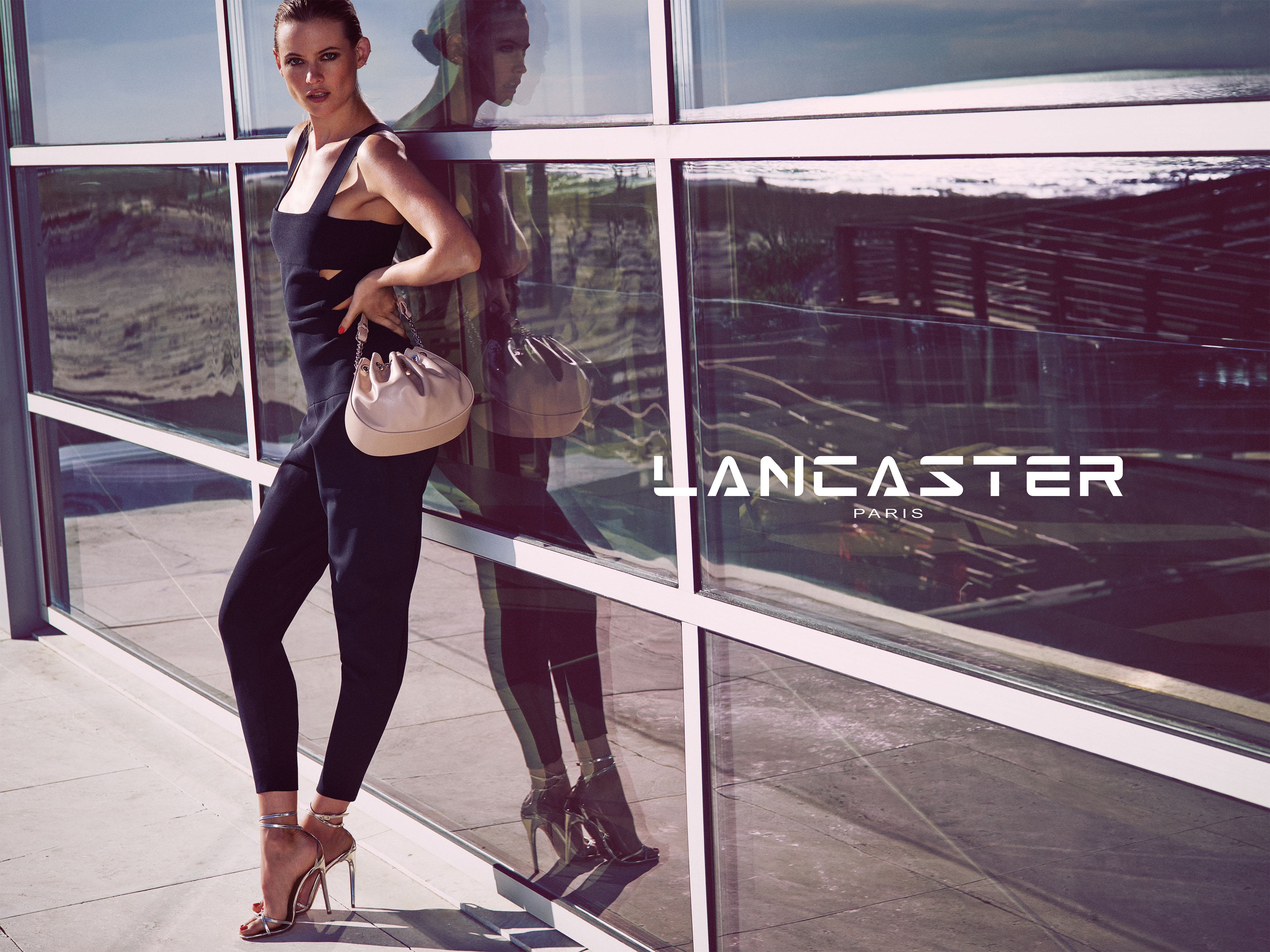 Behati Prinsloo's Got Summertime In The Bag For Lancaster Paris