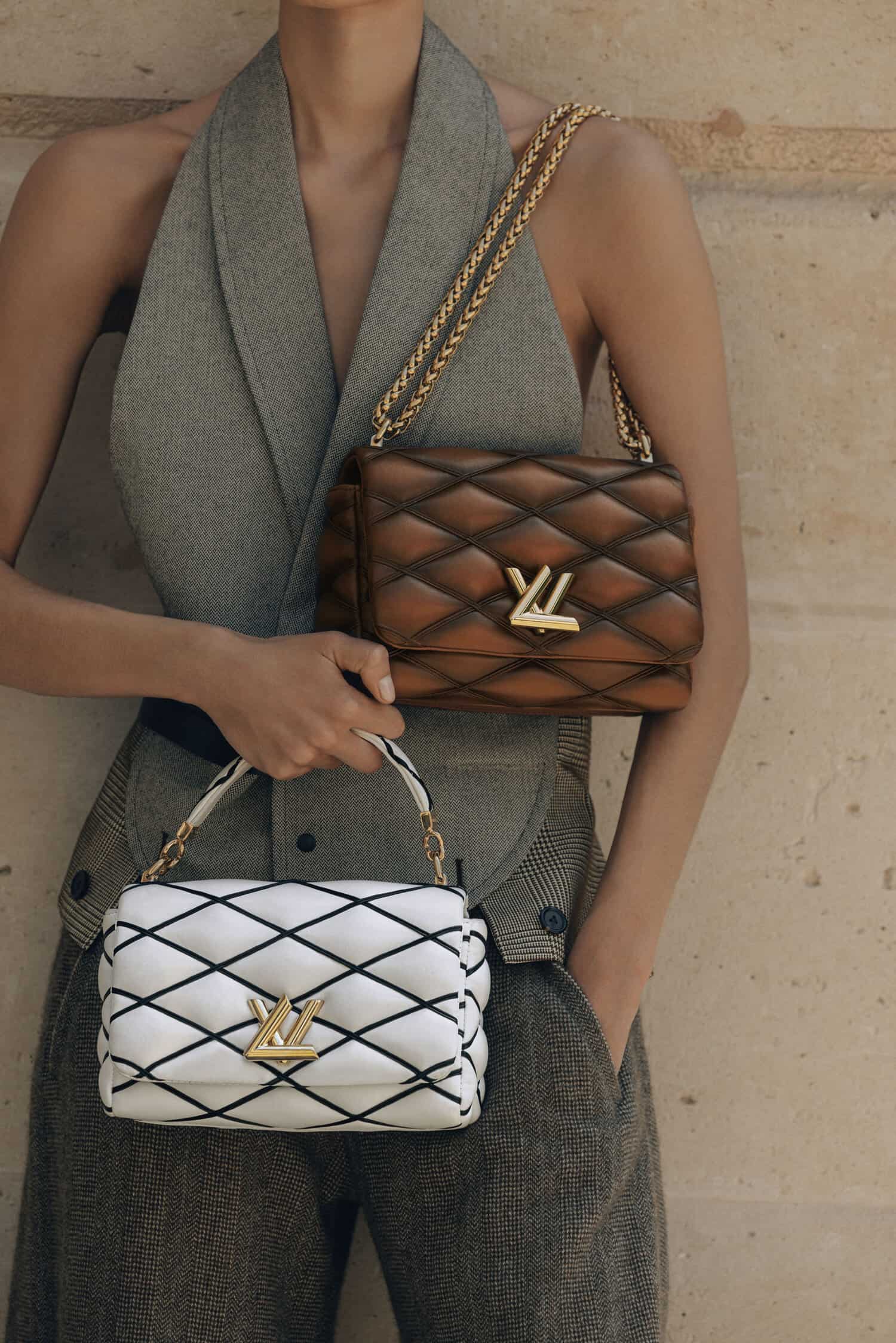 Twist: LV Brand Mark Twist Lock Handbags